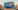 Illustration camion de demenagement bleu ouvert