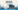 Camion hydrocureur bleu nettoie canalisation haute pression